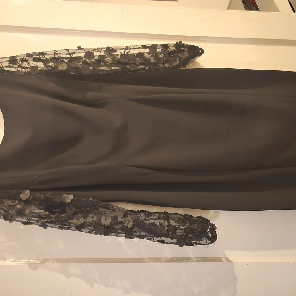 Elegant Black Dress with Floral Sleeves - Picture 1 of 12